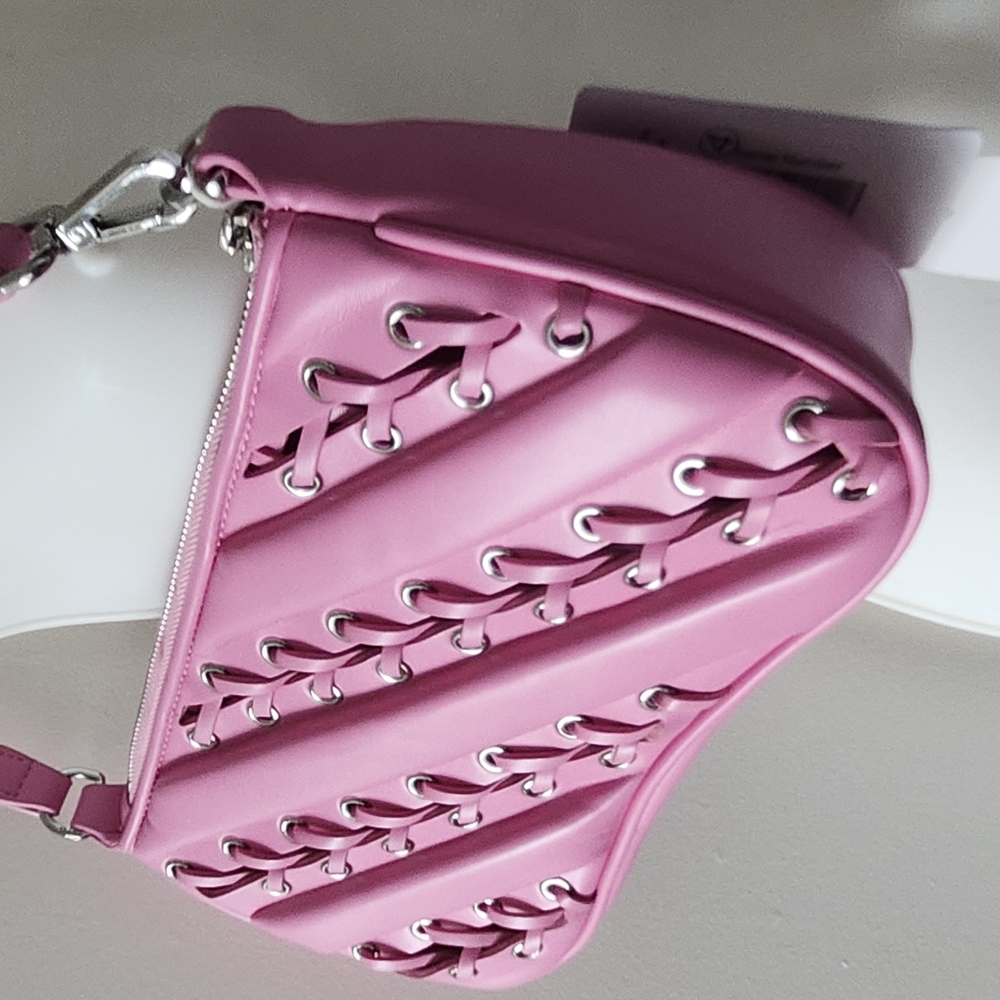 Pastel Pink Shoulder Bag with Intricate Lacing and Silver Hardware